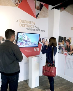 Potential buyers using vr headsets to view new communities