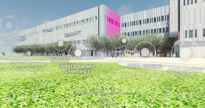 VR architecture image of the building when completed from outside on the lawn looking at a grey 3 story building with many windows